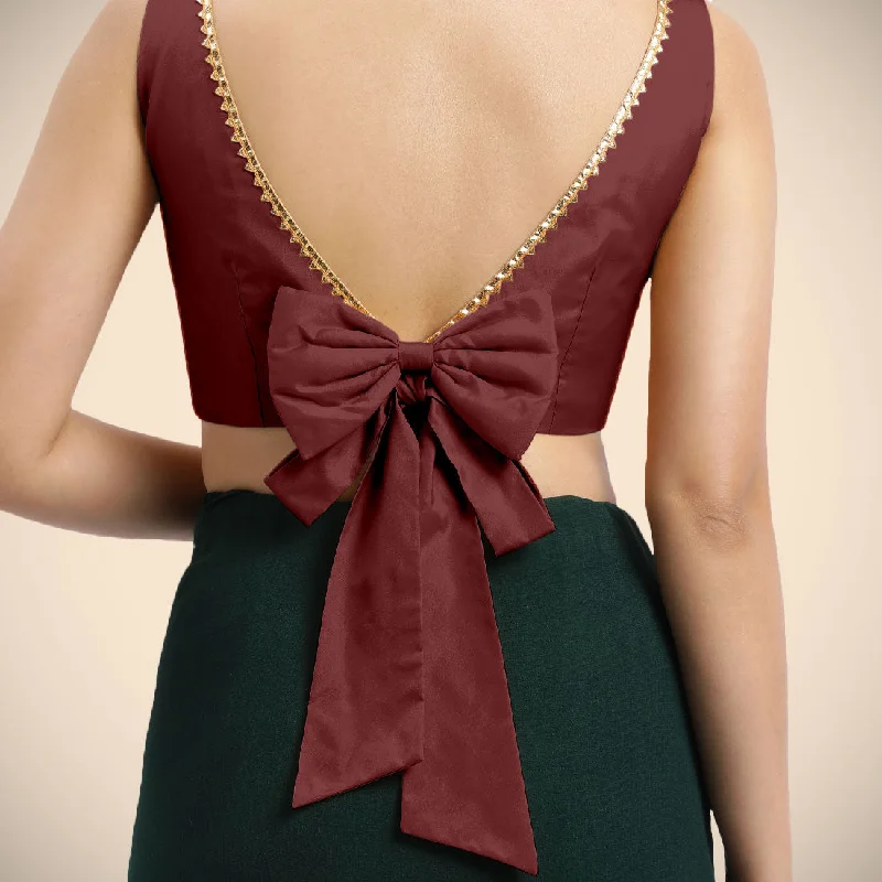 Sherry x Tyohaar | Burgundy Sleeveless FlexiFit™ Saree Blouse with Simple Golden Gota Lace on Neckline and Removable Bow on Back